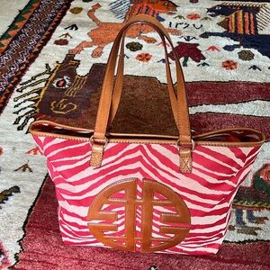 Like new ANTONIO MELANI Tote Red & Cream animal print canvas w/tan leather trim